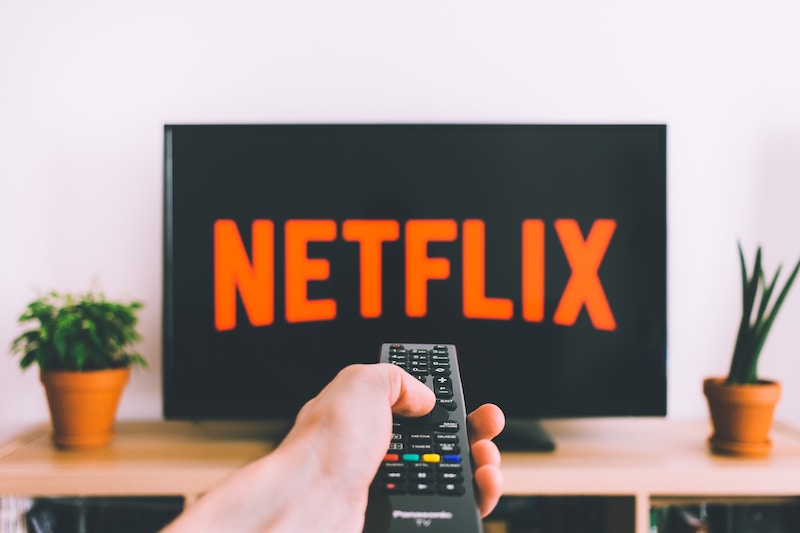 Netflix on TV Screen with remote control