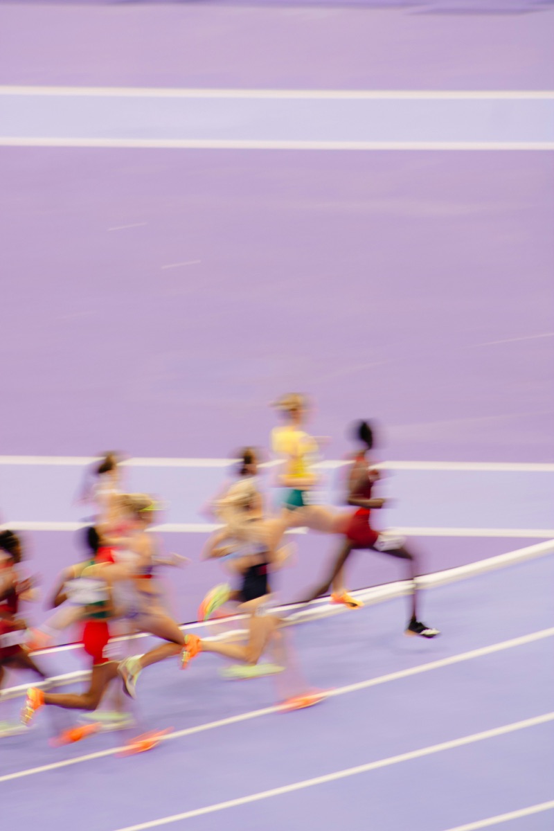 Runners racing on a track